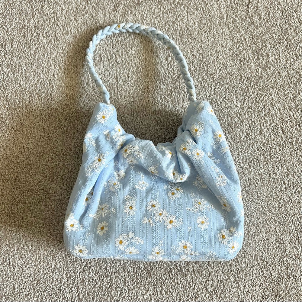 Urban Outfitters blue daisy bag